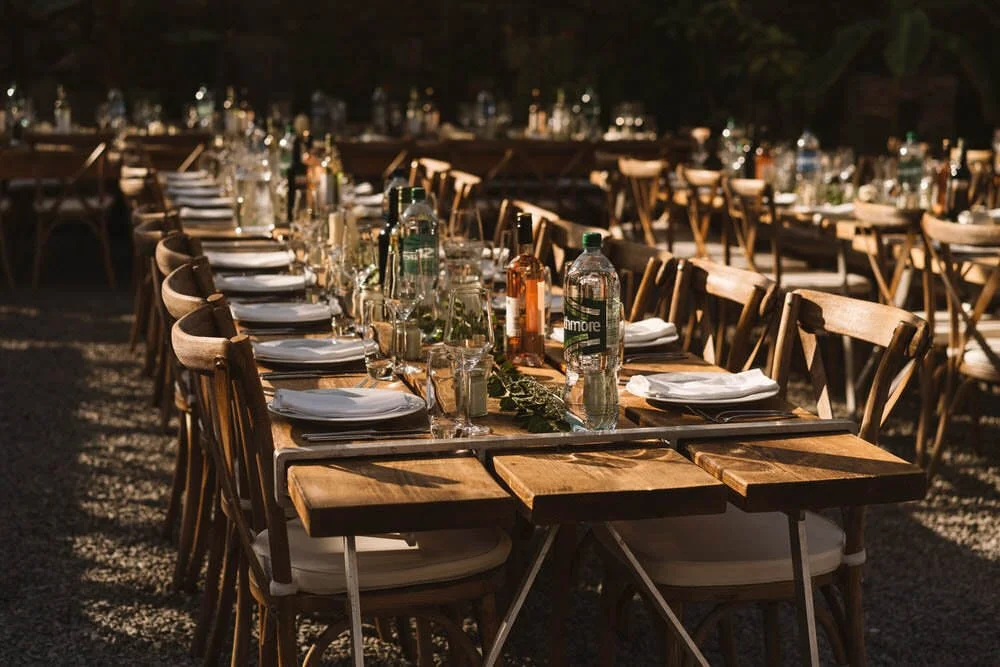 Long table wedding breakfast set up in sun
