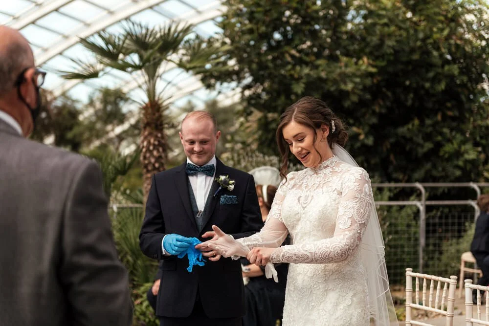 Bride putting on rubber gloves