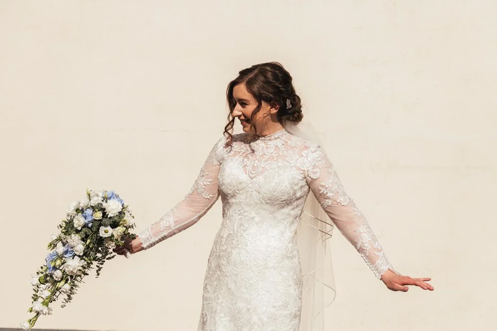 Bride spinning in dress