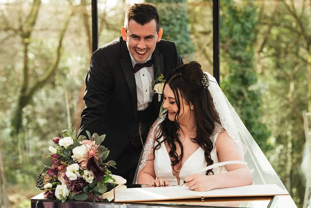 Register signing at Fairyhill wedding