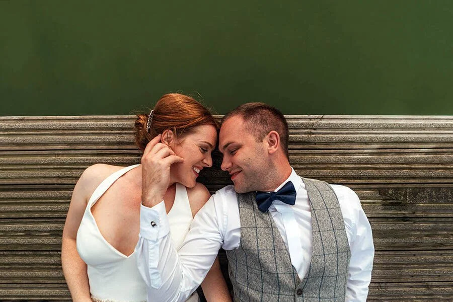 Wedding couple laying on a pontoon at Hensol castle.