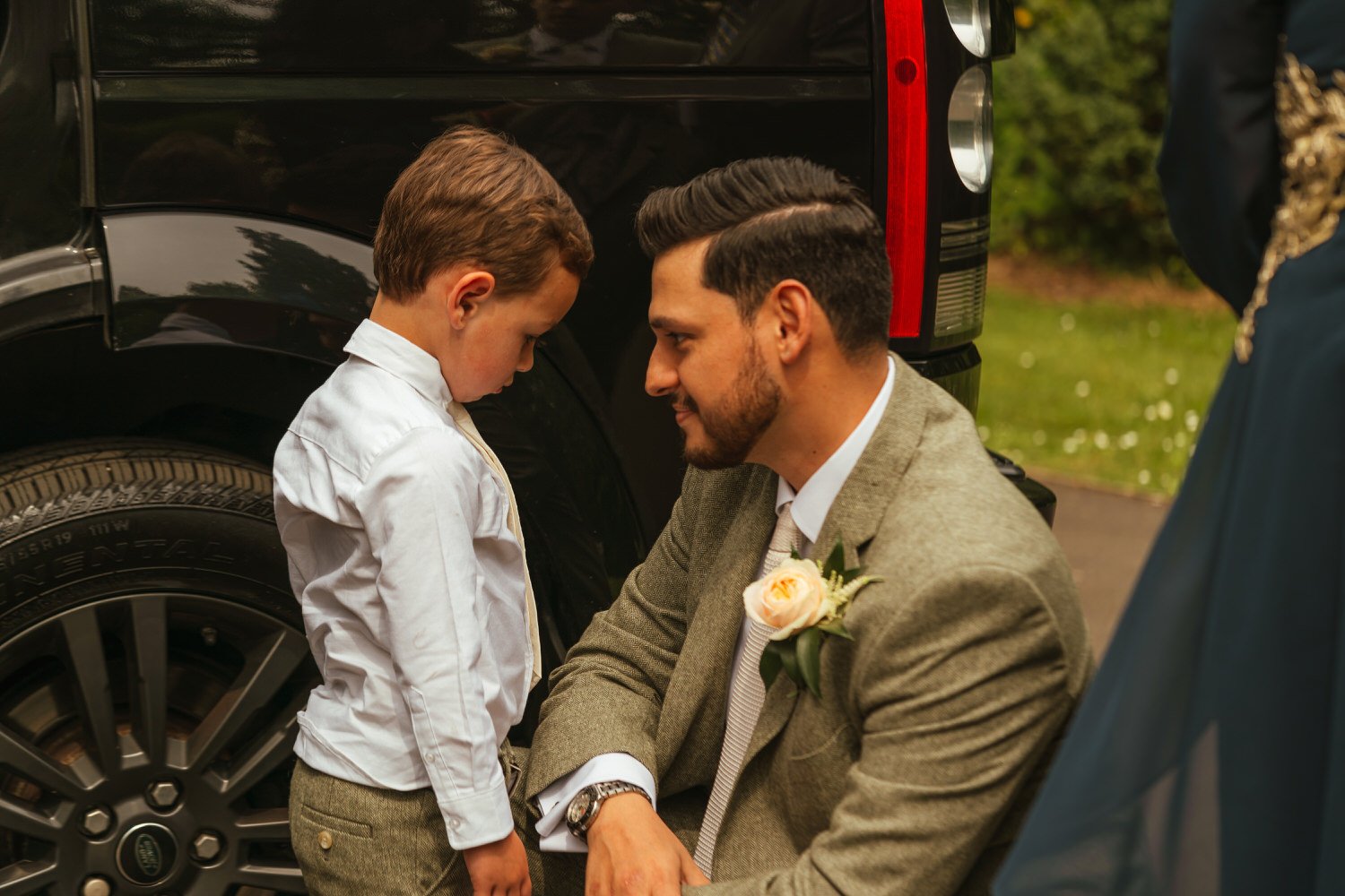 groom with son- Swansea-wedding-photographers-Morgans-Hotel-South-Wales-Videogrraphy- (14).jpg