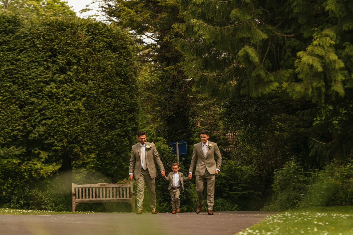 groomsmen walking-Swansea-wedding-photographers-Morgans-Hotel-South-Wales-Videogrraphy- (15).jpg