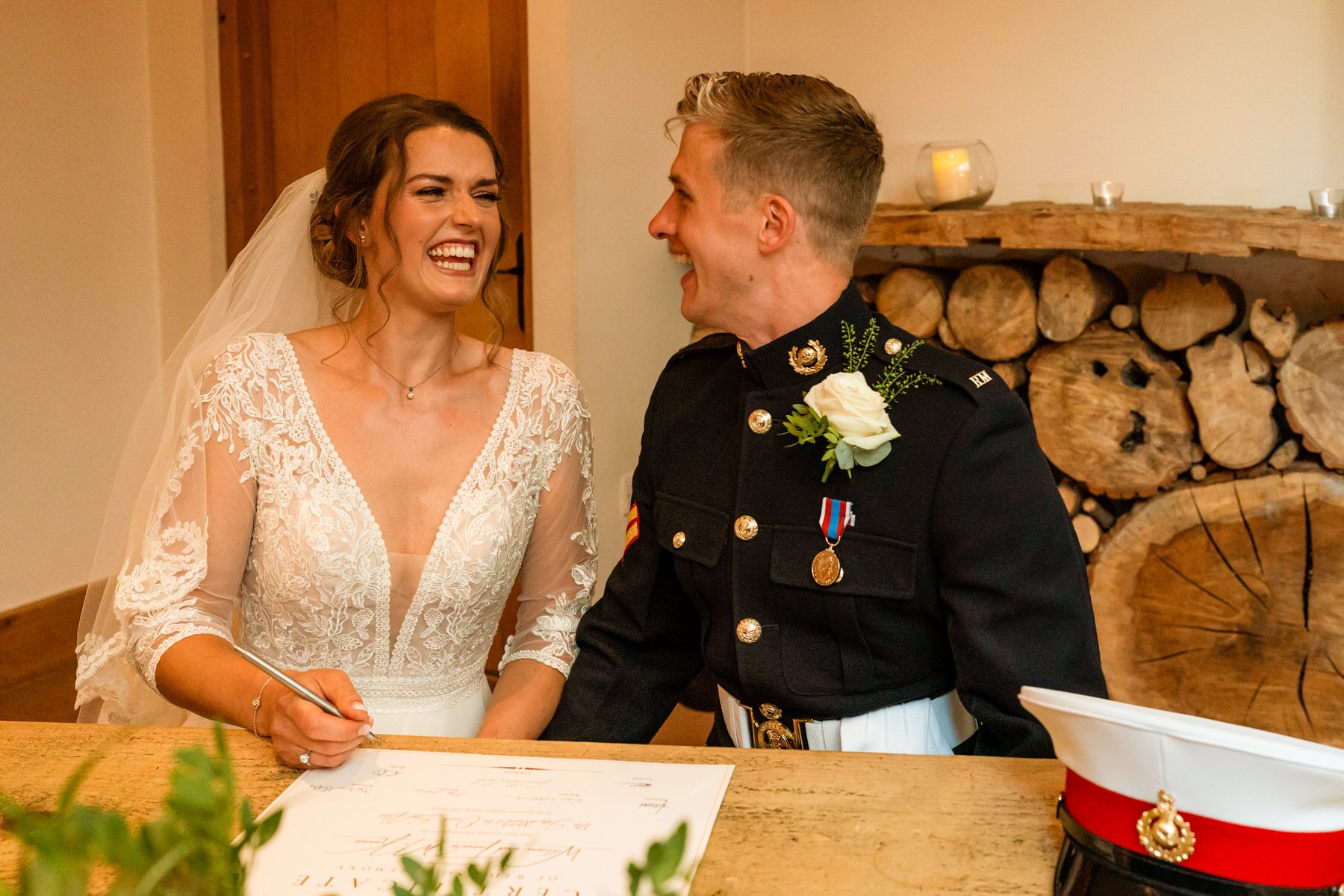 Bride and groom signing register 