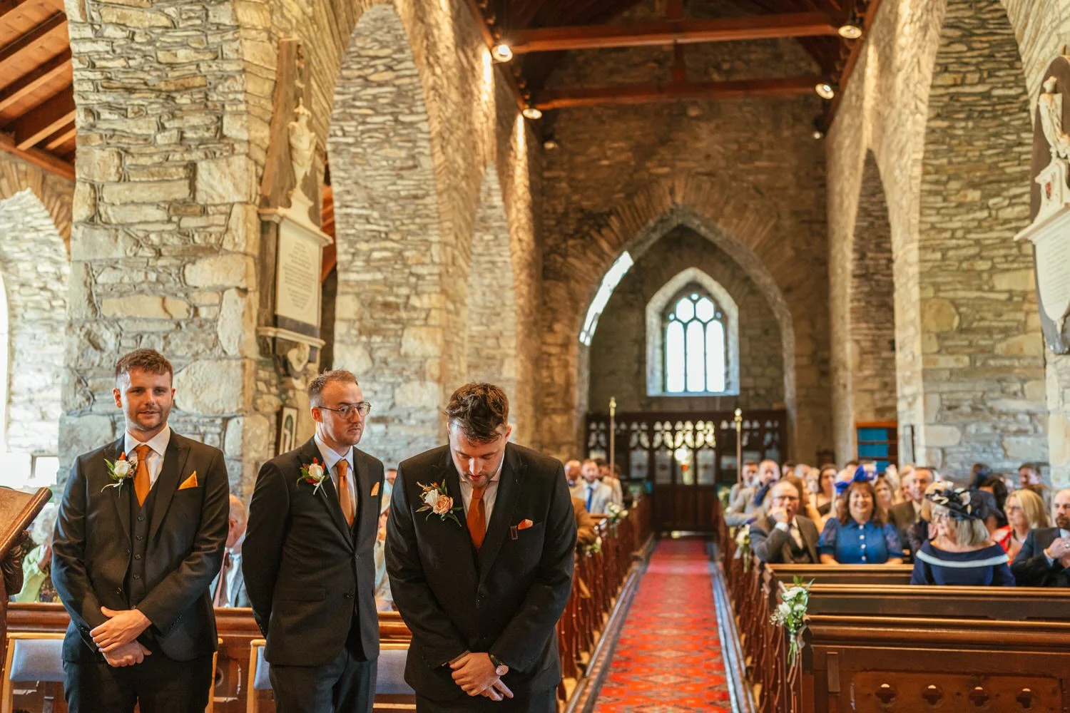 Groom waiting at altar