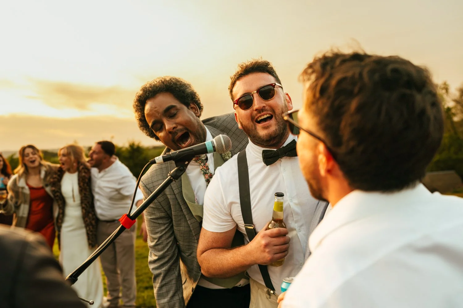 wedding guests singing