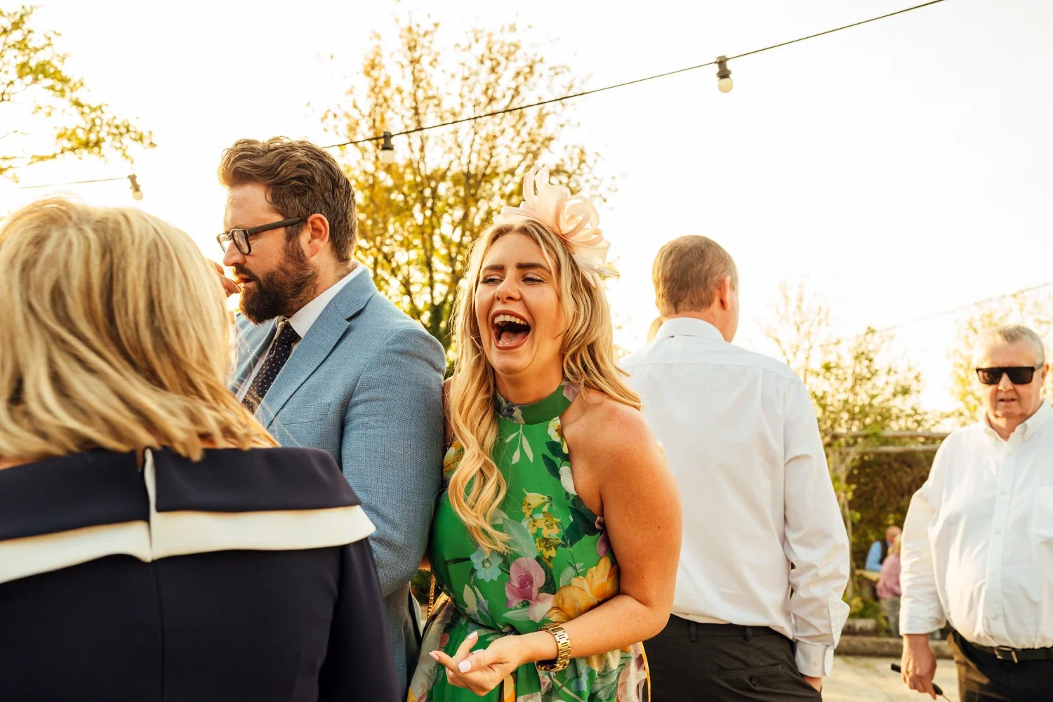 laughing wedding guest