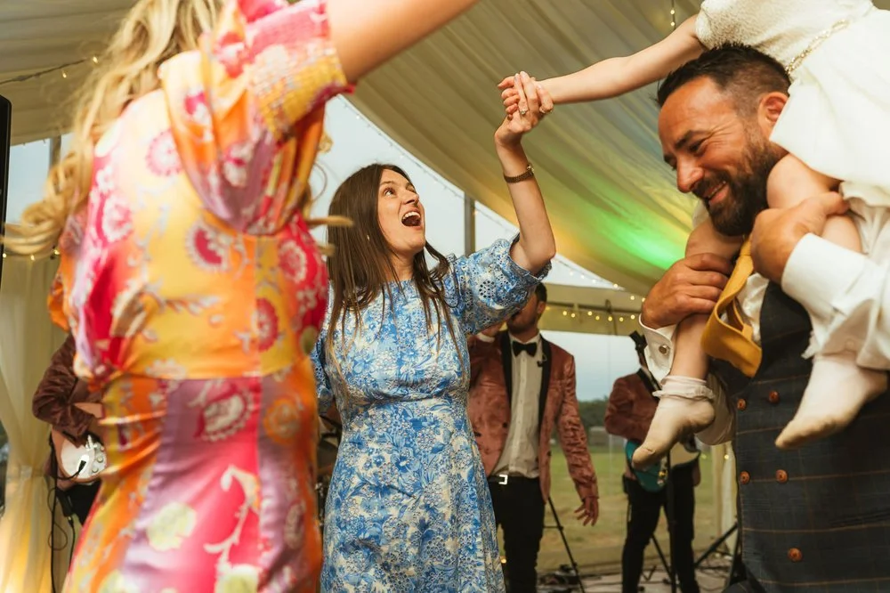 Guests dancing in marquee