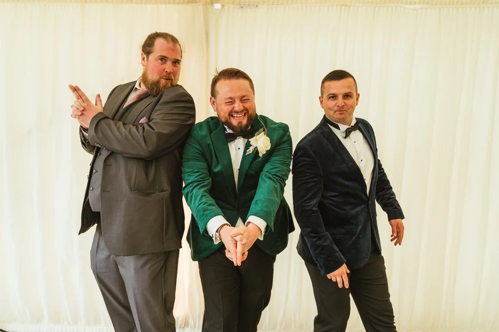 Groom's Charlies Angels pose.