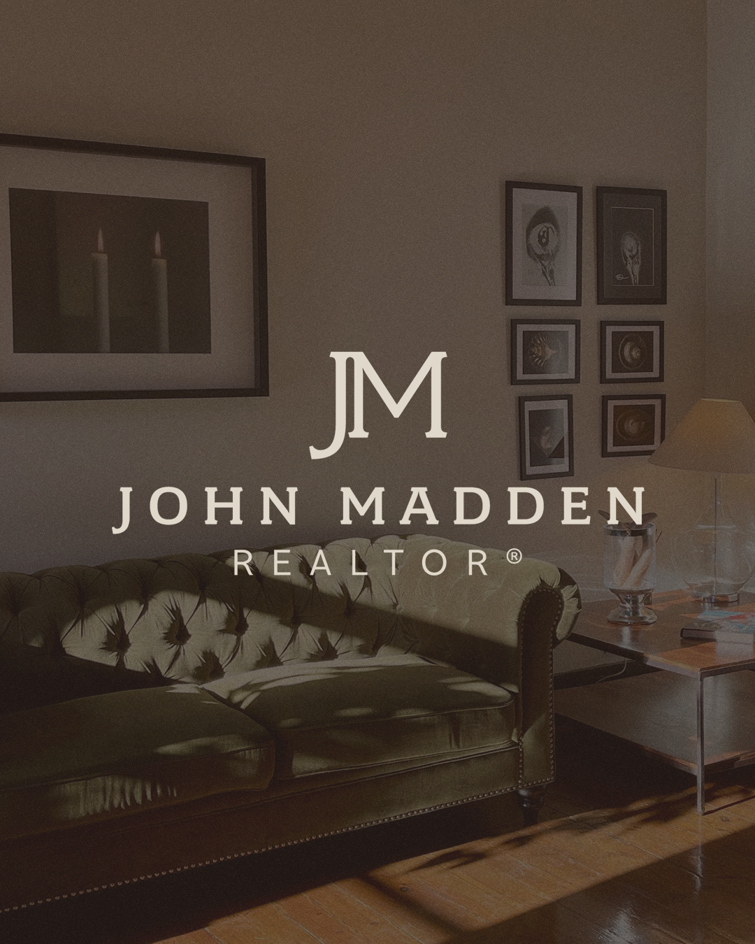 Igni Made | Copywriting, Branding & Websites for Wellness, Hospitality and Creative Businesses | Northern California | Living room with framed pictures on the wall, a green velvet tufted sofa, side table with a lamp, and shadow patterns on the floor.