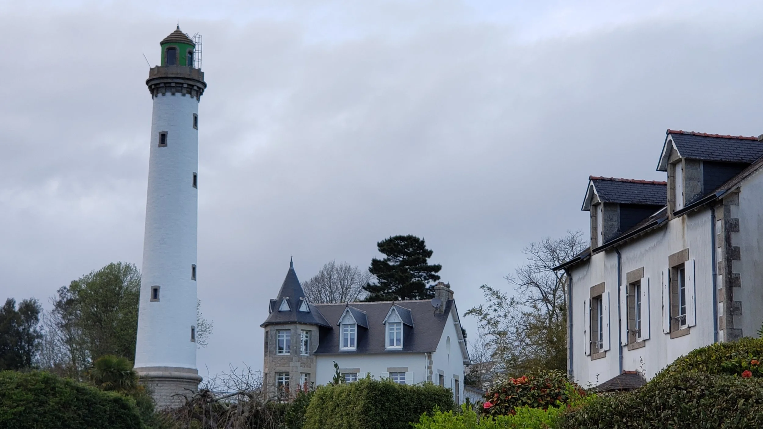 The Phare de la Pyramide lighthouse rising above the town of Bénodet, Brittany, France
