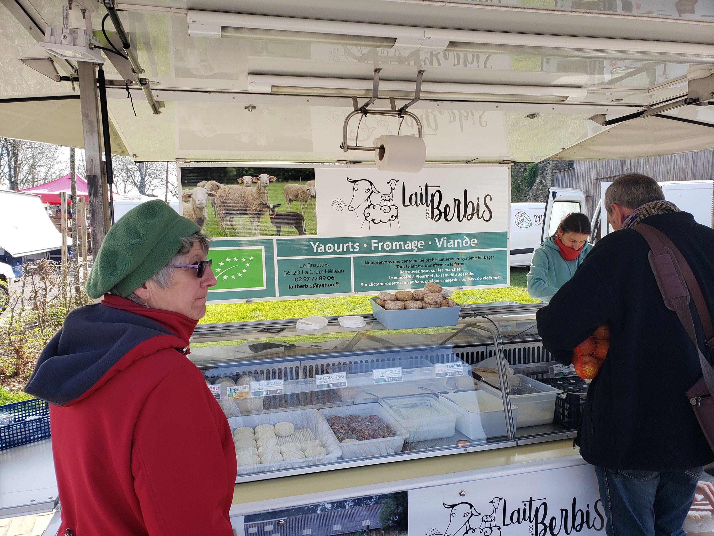 The GAEC Lait Berbis stand at the weekly Friday market in Ploërmel, France, selling exceptional sheep's milk yogurt and cheese made fresh on their local Breton farm.