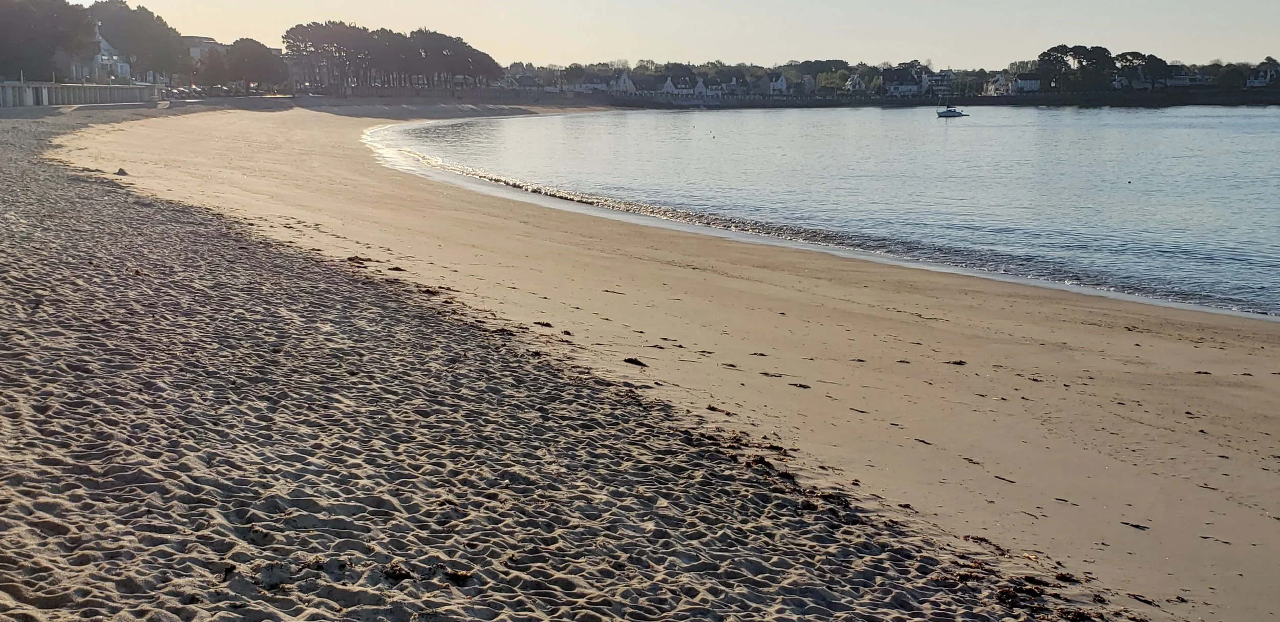 Golden hour light settling over the beach at Bénodet, Brittany's 5-star coastal resort town