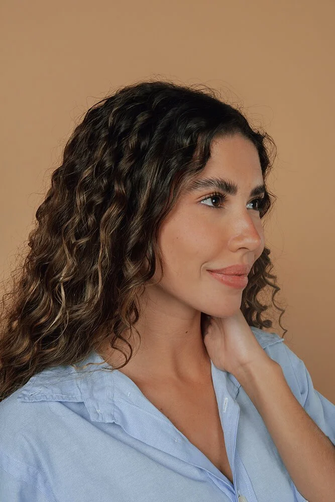 woman smiling after fillers in midlothian virginia