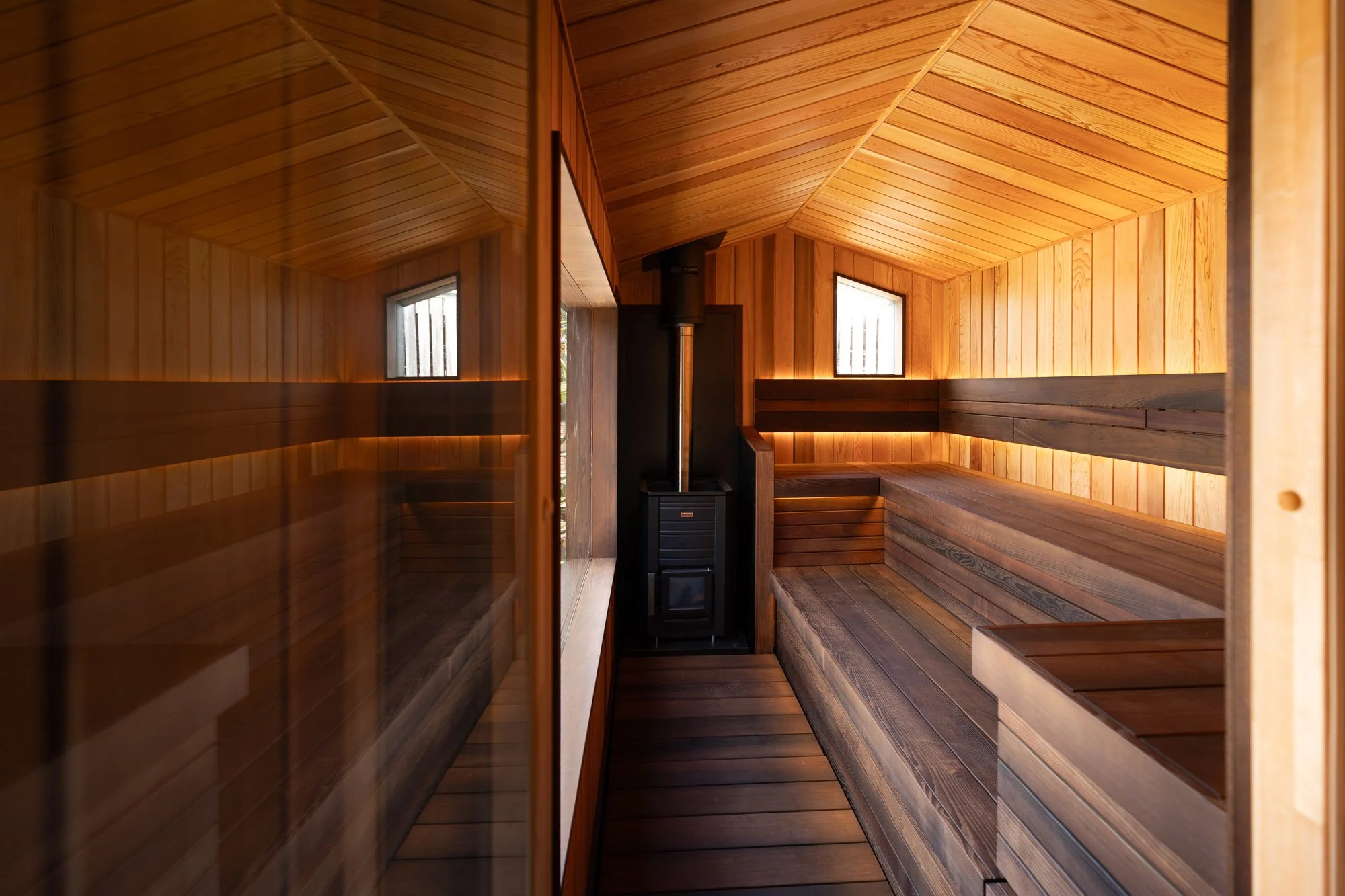 The interior of a sauna at Northshore Itchenor by Rewild Sauna