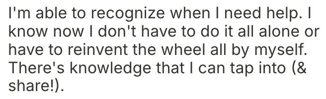 Close-up of a person holding a wheelchair wheel, emphasizing the ability to recognize when help is needed and tap into assistance.
