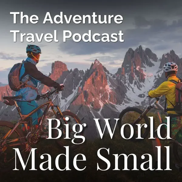 Two mountain bikers with helmets and backpacks overlooking a mountain range at sunset, promoting The Adventure Travel Podcast titled 'Big World Made Small'.