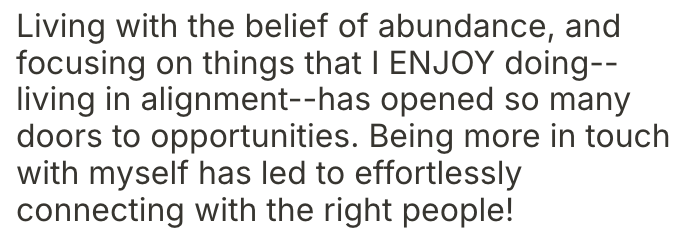 A close-up of a printed or typed paragraph about living with abundance and joy, connecting with the right people.