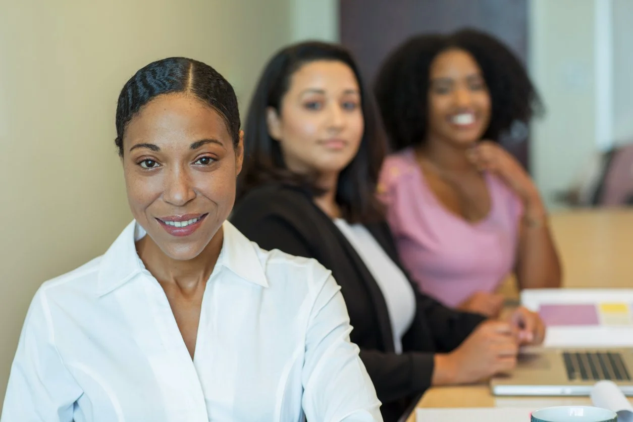 black female lactation counselors at a meeting