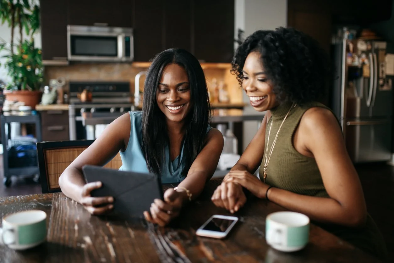 Two black lactation professionals meeting together