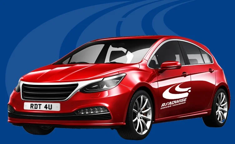 Red hatchback car with 'ROADWISE DRIVING TRAINING' logo on the side, set against a blue background.