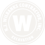 Logo of W. Wilbanks Contractor Inc. specializing in excavation.