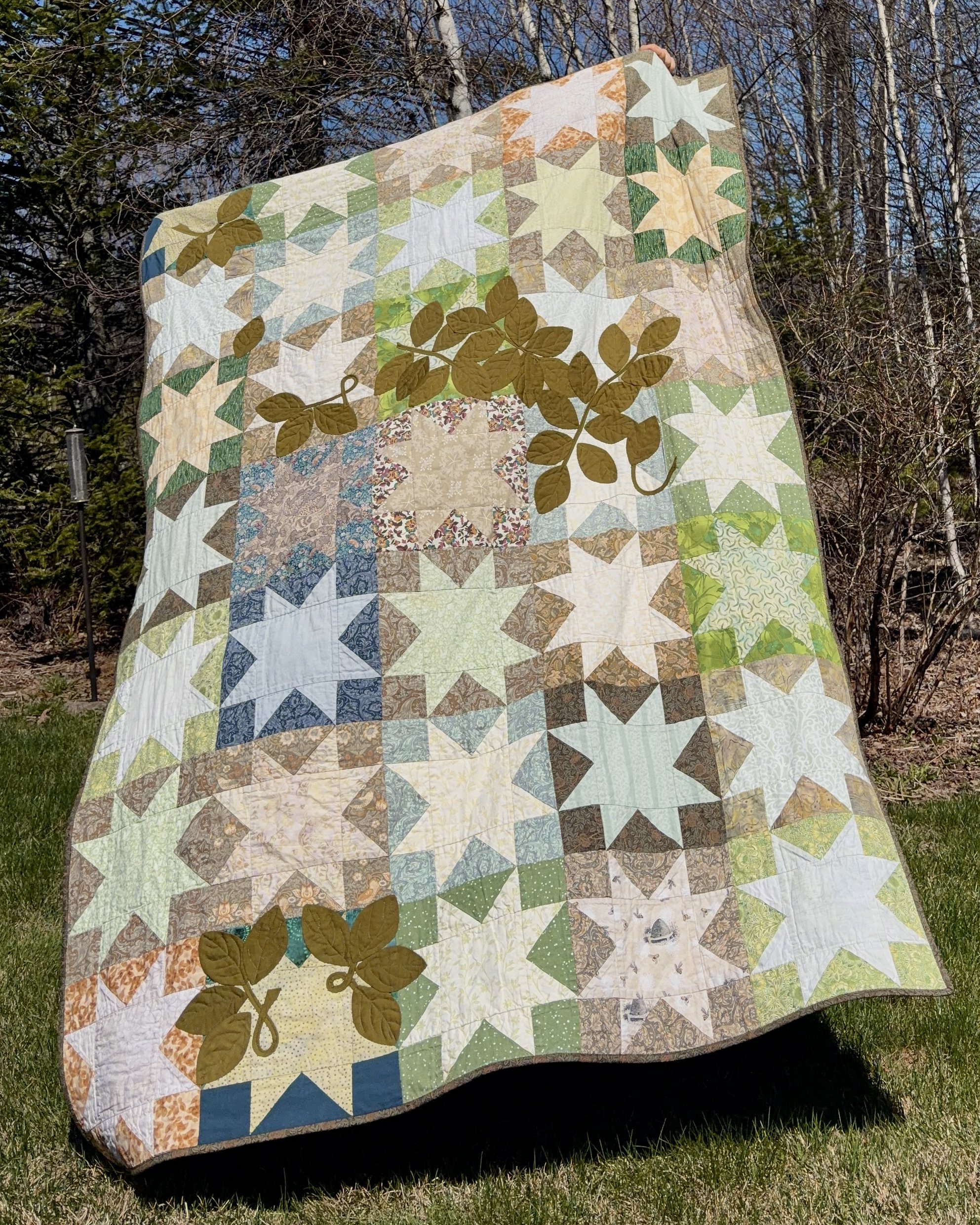Appliqué quilt repair on damaged quilt. Restoring longevity while adding creativity in design. 