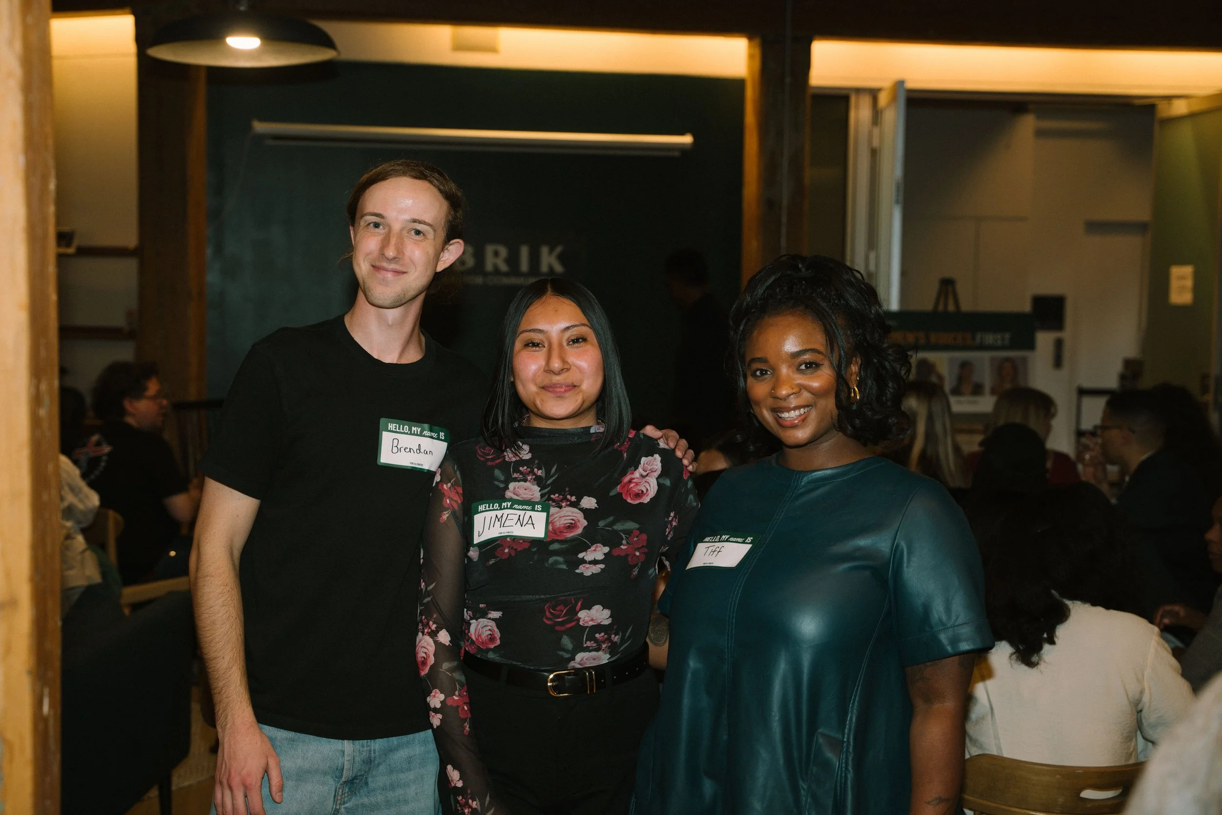 Brand Curators founder Tiffany Knighten with team members Brendon Raab and Jimena Garcia at a creator community networking event in Brooklyn