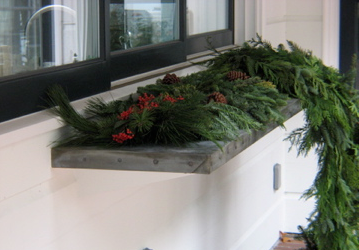 The outdoor serving counter, made of riveted weathered zinc. Photography: IBID (Copy)