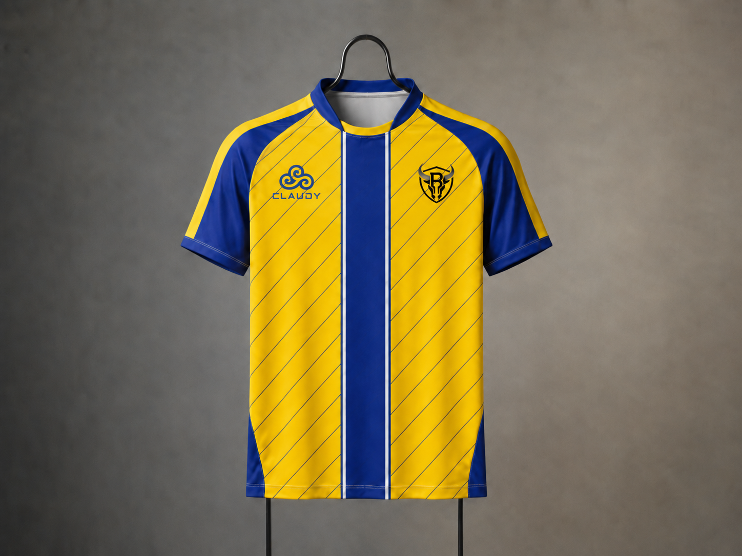 Yellow and blue striped sports jersey with logos and a shield emblem, hanging on a hanger against a gray background.