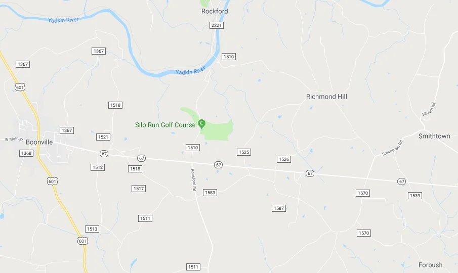 Map showing roads, rivers, and locations including Boonville, Richmond Hill, Smithtown, Forbush, and the Silo Run Golf Course near the Yadkin River.