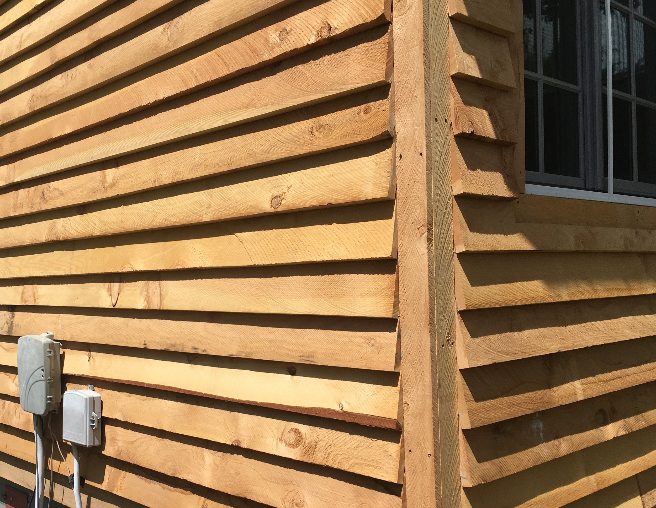 Residential clapboard siding in circle-sawn cedar