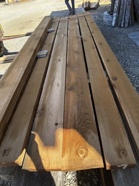 Freshly milled western red cedar boards