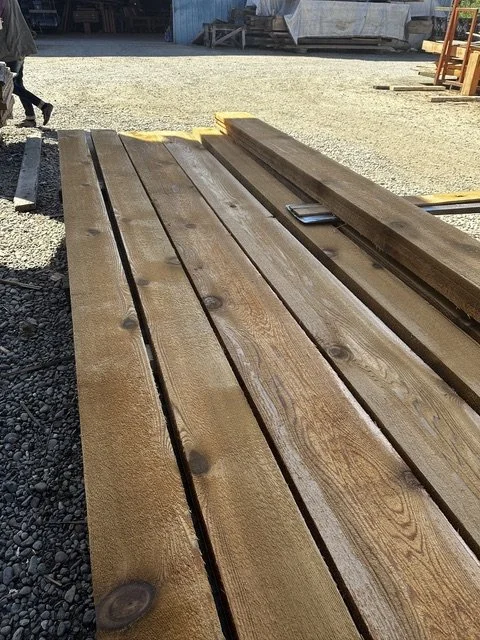 Freshly milled western red cedar boards