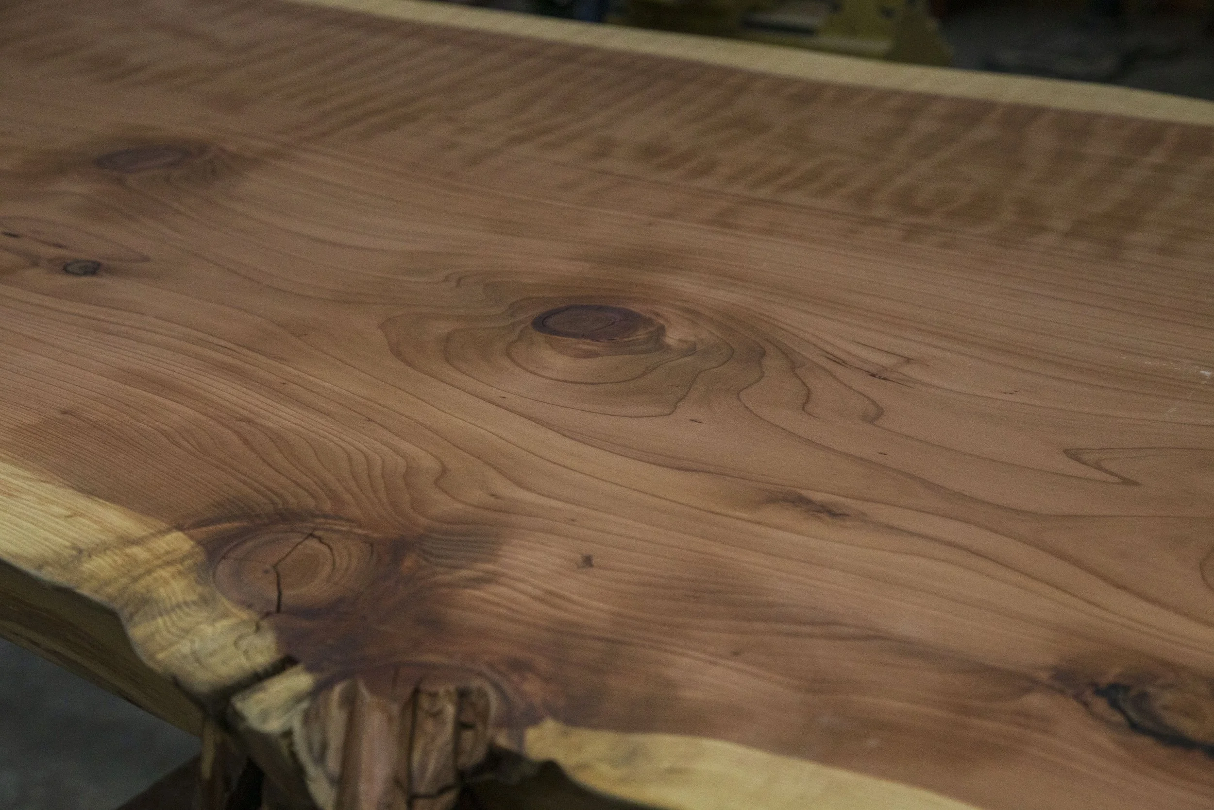 Knots and grain in surfaced redwood slab