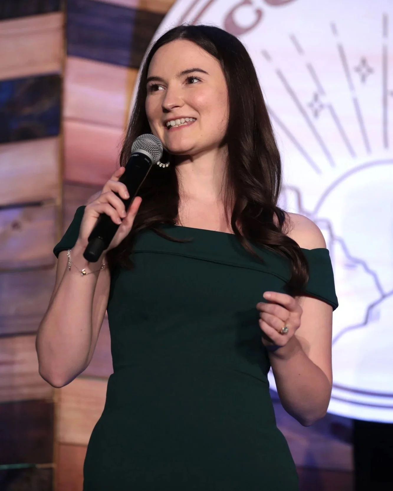 Danielle Franz speaking on stage