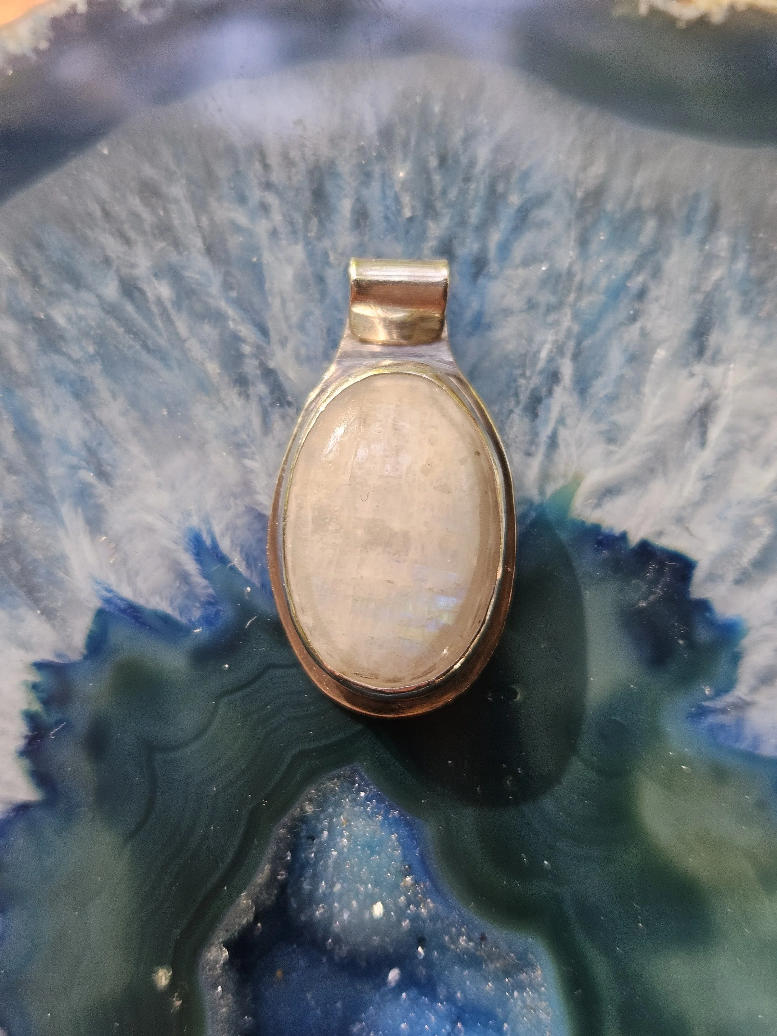 Classic Oval Rainbow Moonstone Pendant Set in .925 Sterling Silver