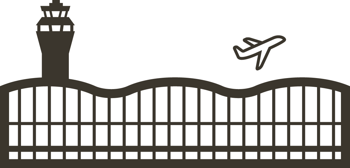Silhouette of an airport control tower, airplane, and airport fence.