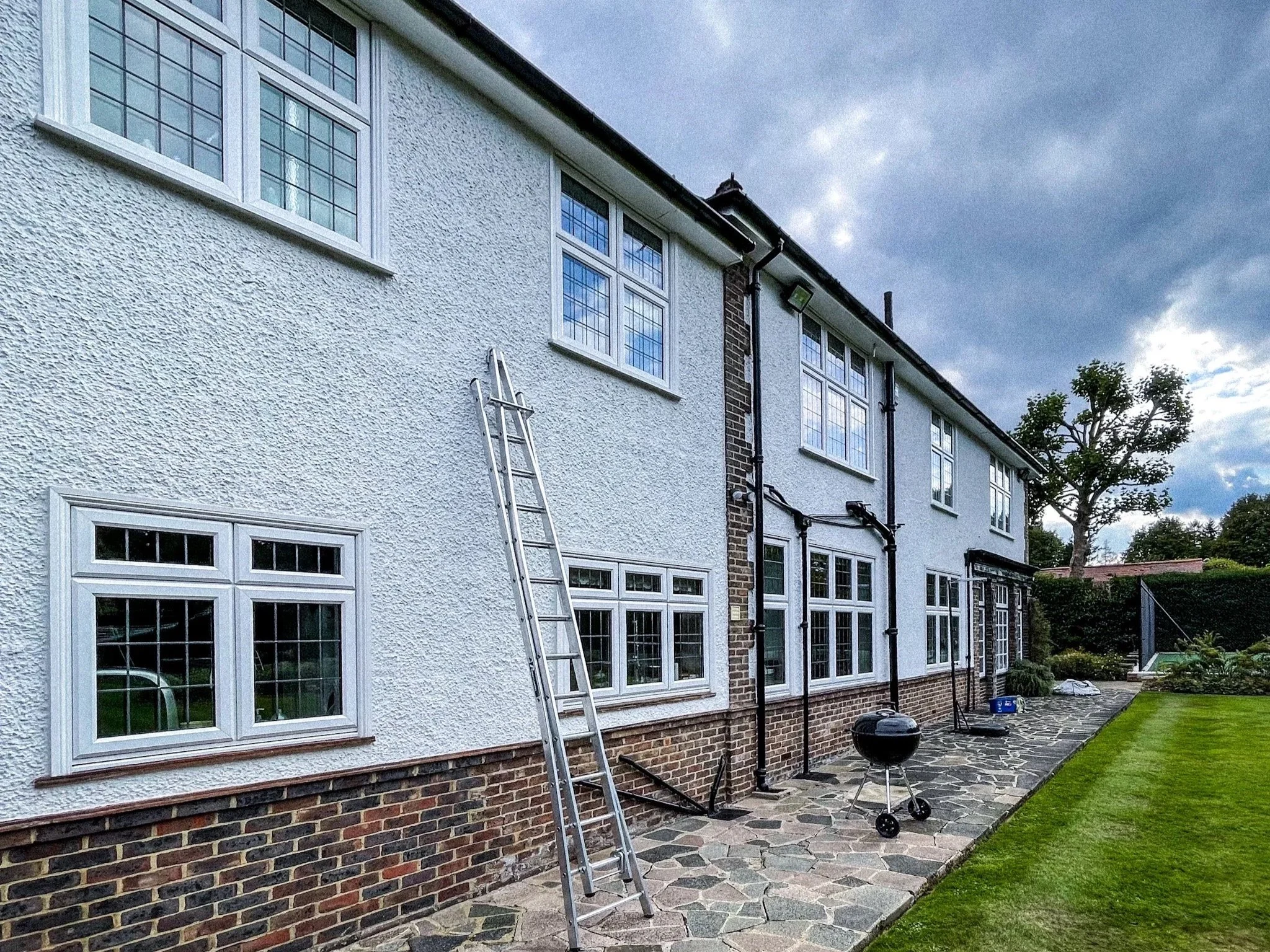 Clean windows on a house in Hailsham 