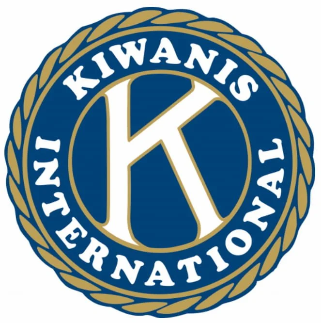 Kiwanis International logo with a gold rope border, navy background, and a large white letter K in the center.
