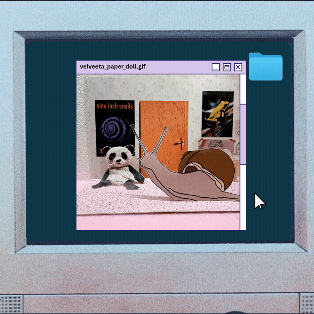 A computer screen displaying a folder named 'velveeta_paper_doll.gif'