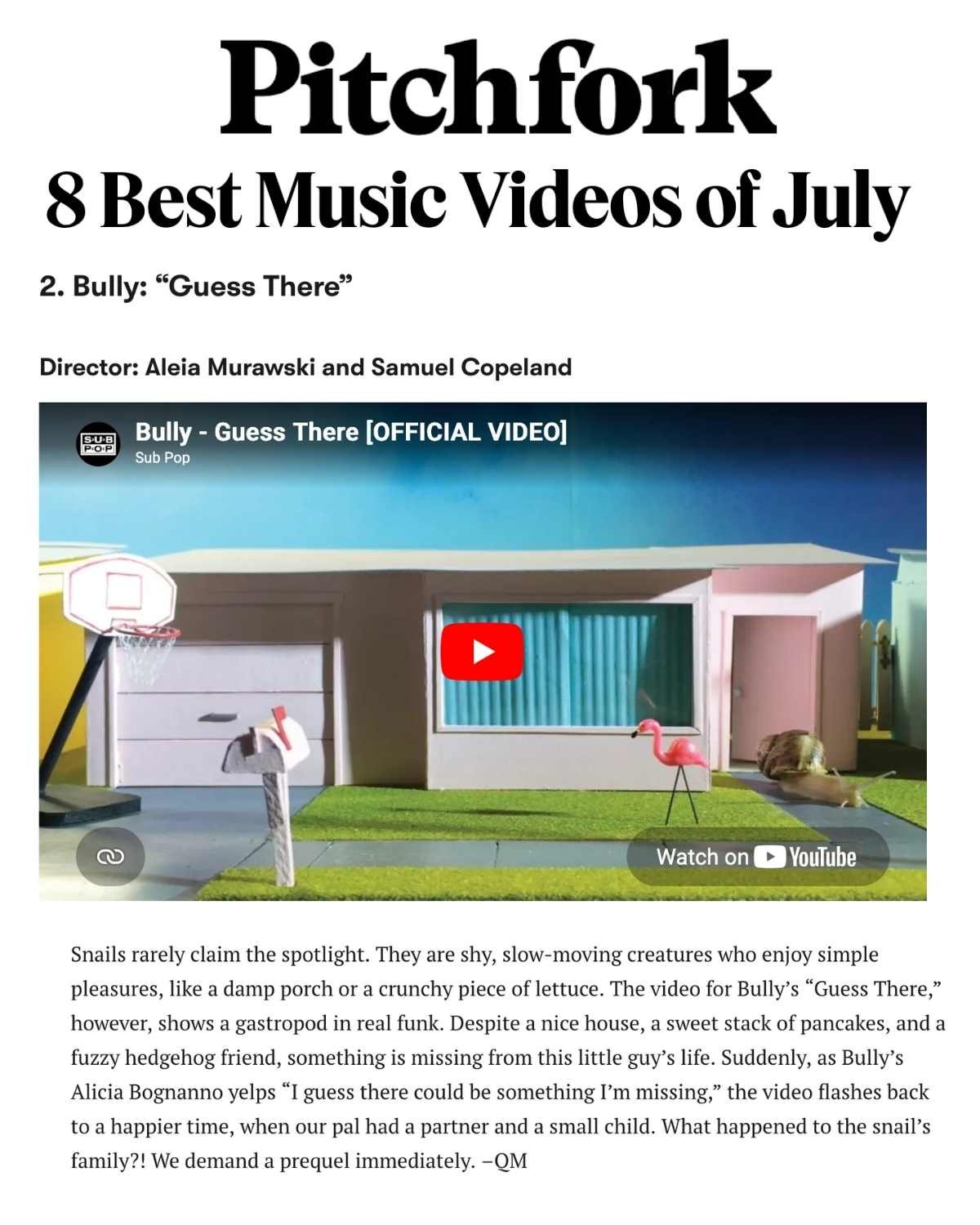 Screenshot of an article titled 'Pitchfork: 8 Best Music Videos of July,' featuring Bully's 'Guess There,' showing a miniature model house with a pink flamingo lawn and snail. A music video by directors Aleia Murawski and Sam Copeland 