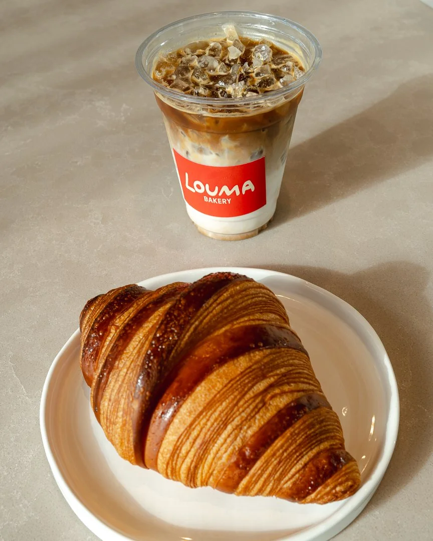 Croissant and iced latte in a Louma Bakery cup, Santa Monica bakery photography