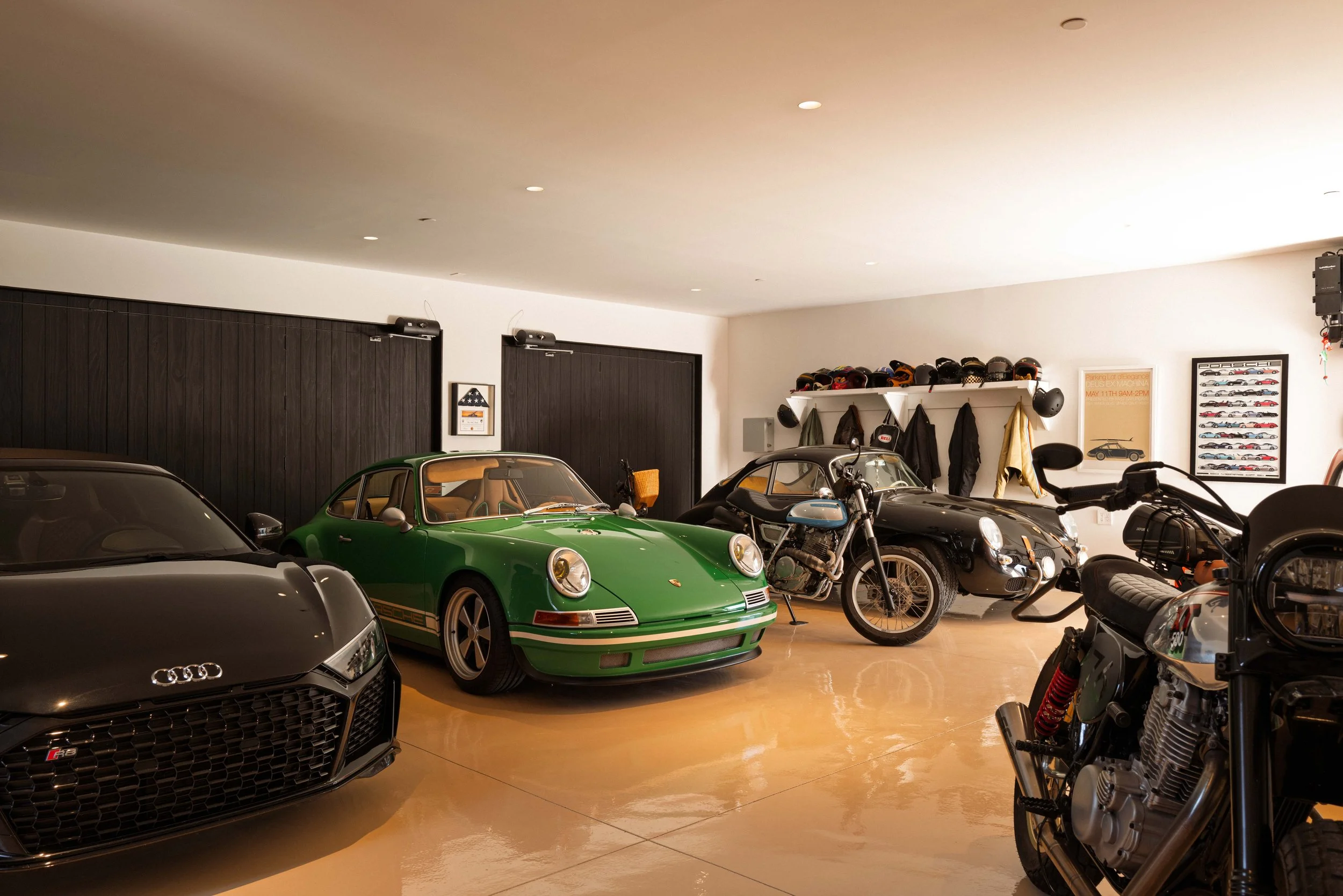 Vintage green Porsche and motorcycles in the car gallery garage, Point Dume Malibu