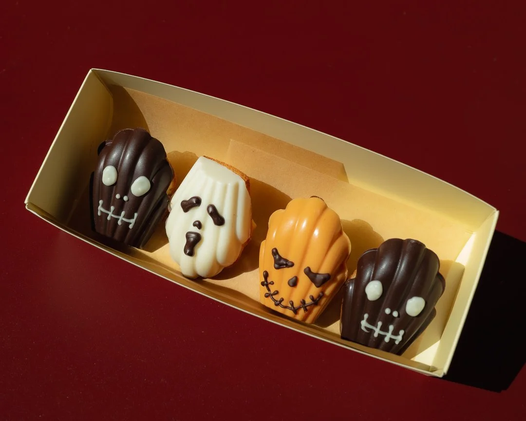 Box of ghost, pumpkin, and skull Halloween madeleines, Louma Bakery fall photoshoot