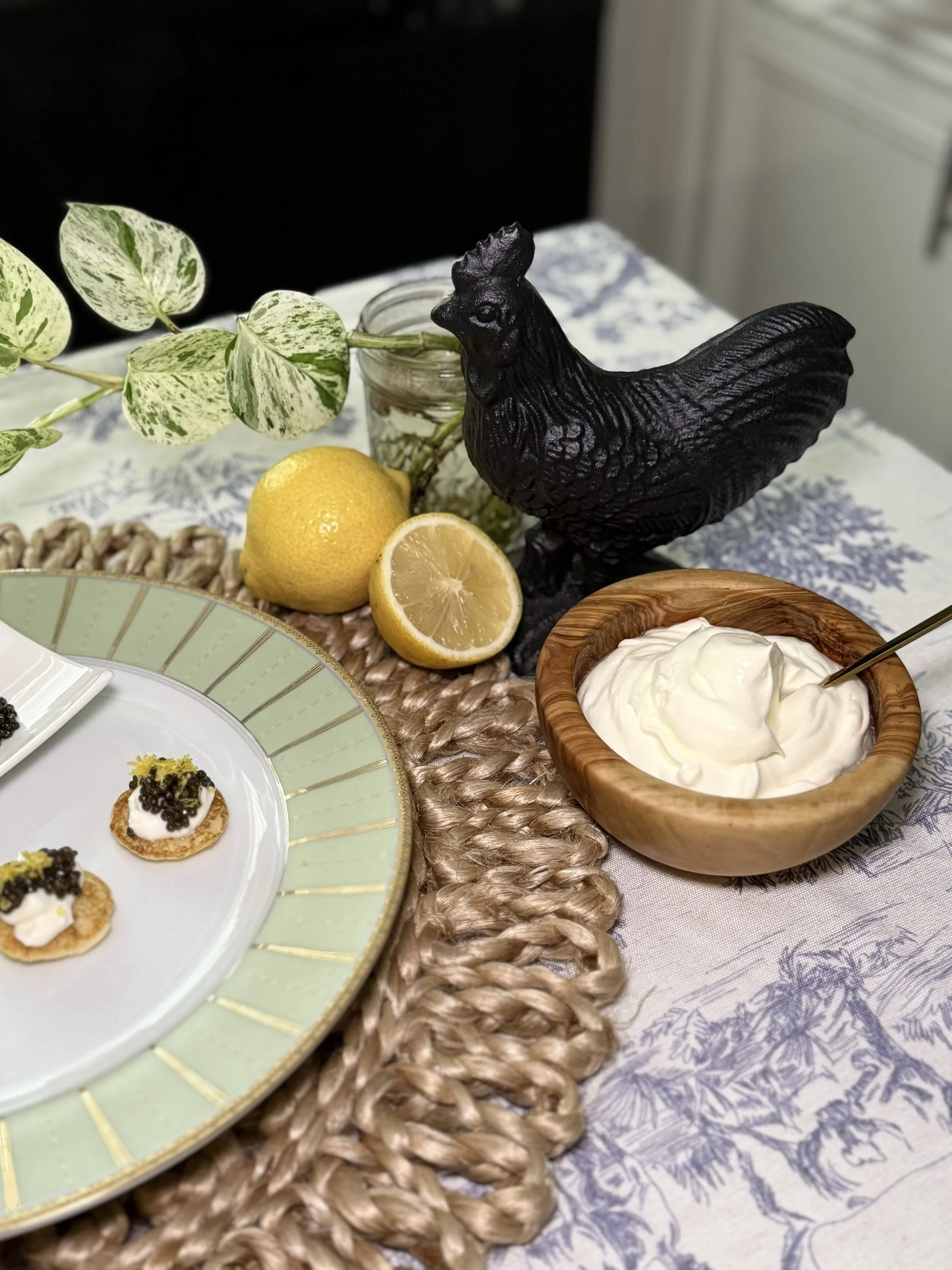 Lemon blini plated with chicken statue.jpg