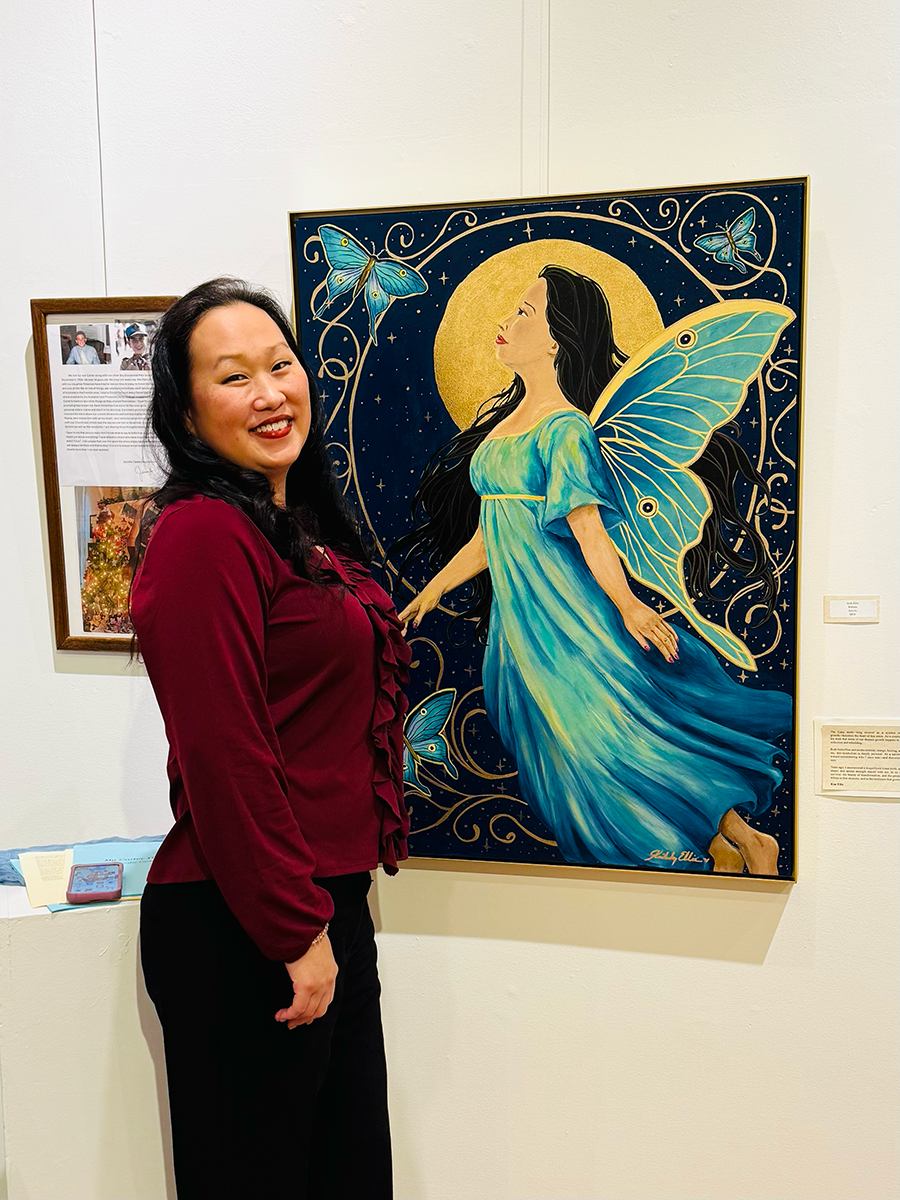 Kim Ellis with Reborn painting at Rawls Museum Arts.png