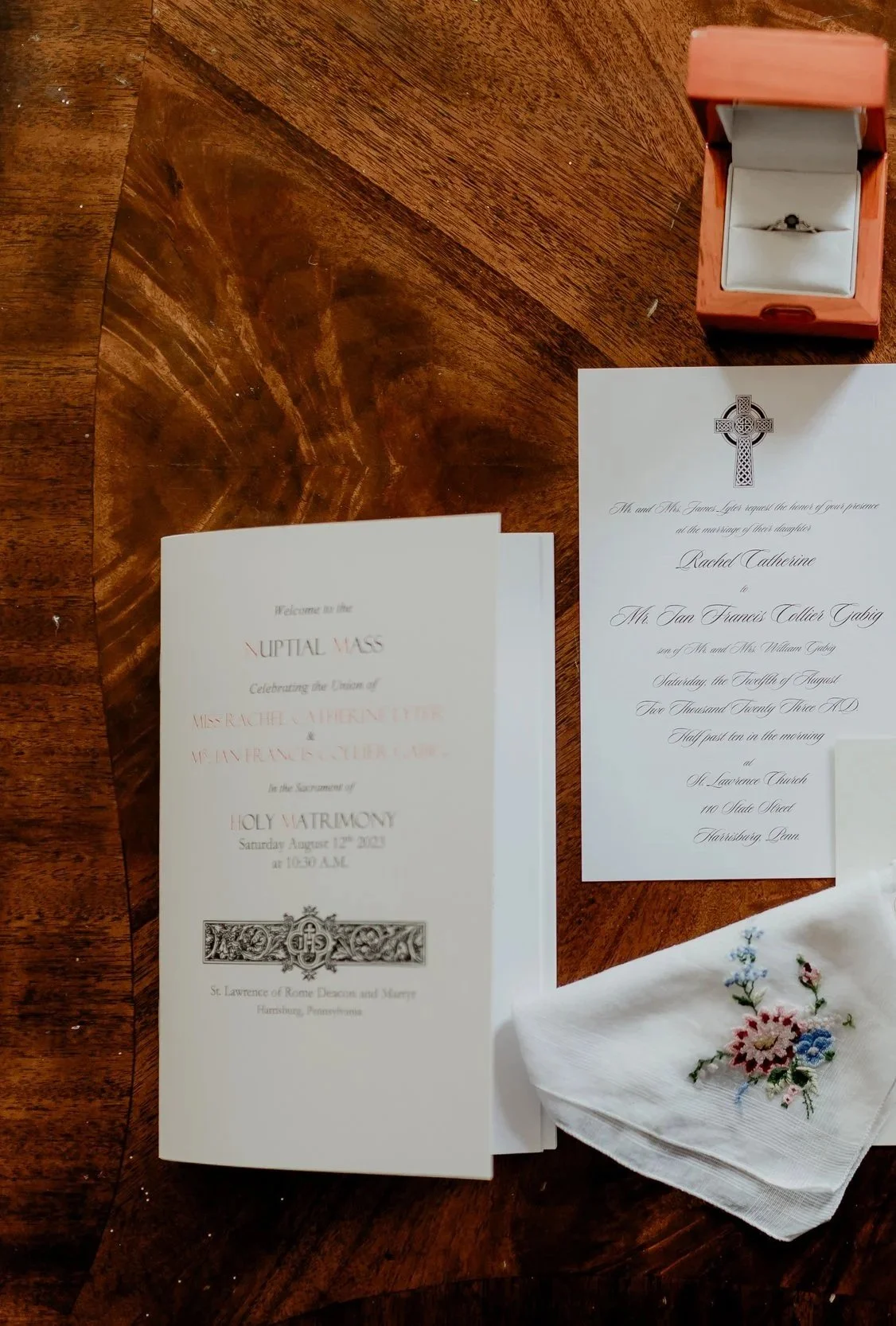 A TLM missalette and wedding invitation are captured an a real image from the author's wedding
