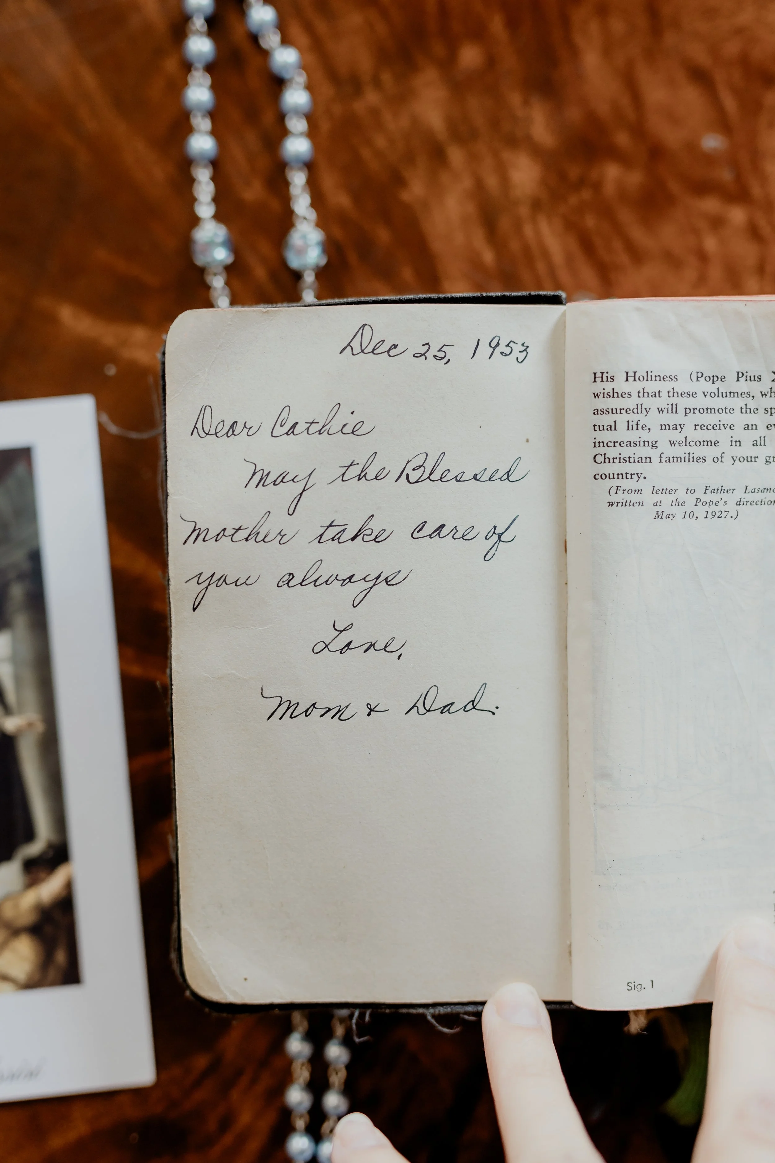 Photo of a 1950s era Catholic family heirloom with a handwritten note about the Blessed Virgin Mary
