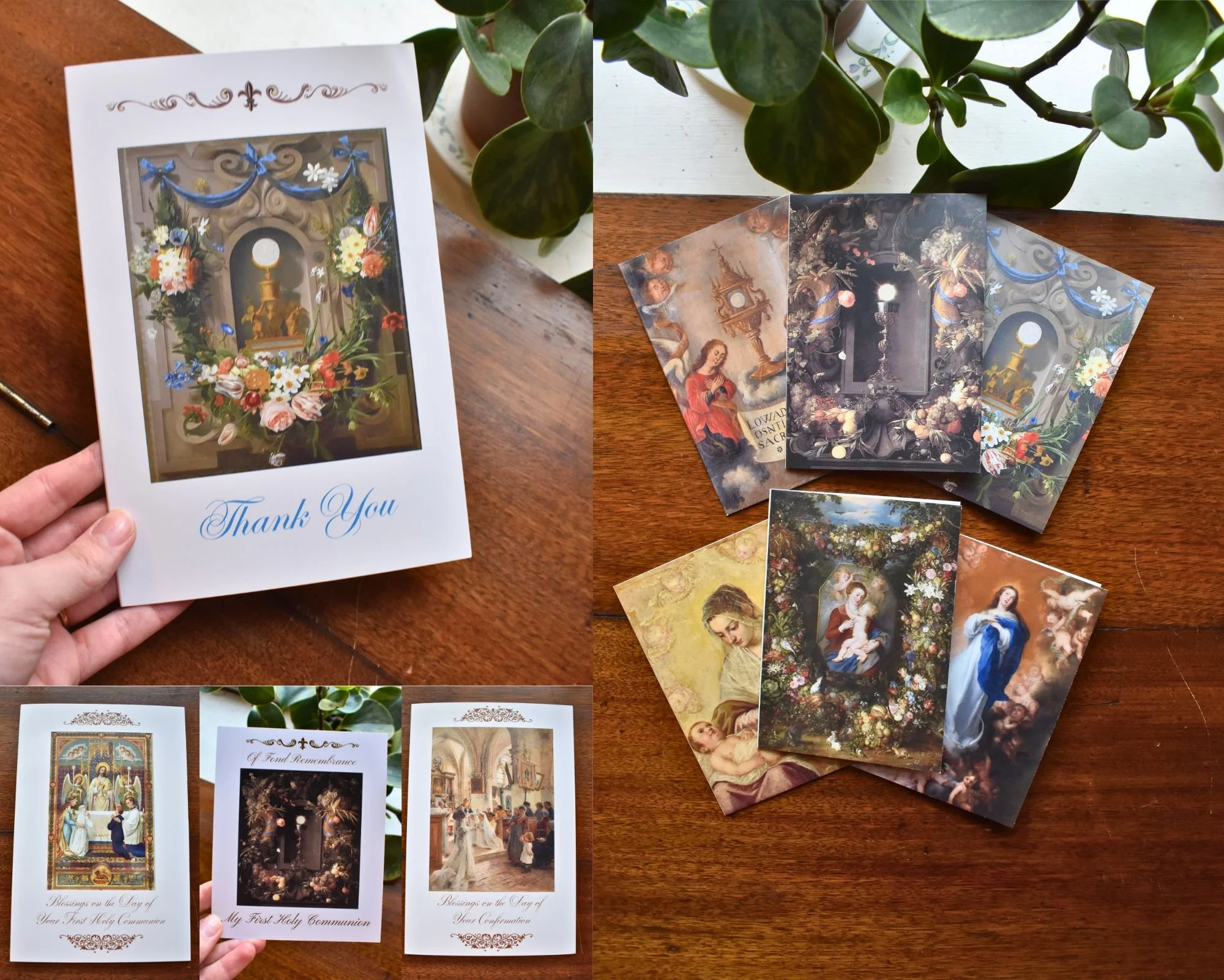 greeting cards featuring classical catholic art are displayed against a wooden background near green houseplant leaves